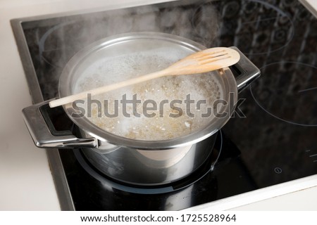 Lifehack: Place a wooden spoon on top of the pot and never deal with overflowing water again.   