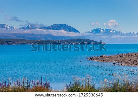 Panoramic picturesque view of Lake Tekapo, located on South Island in New Zealand
