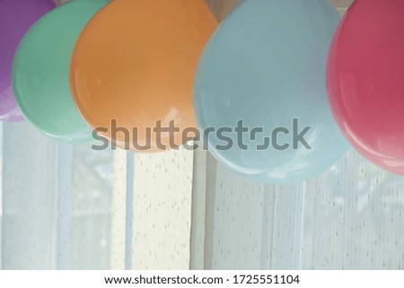 colorful pastel balloon hanging decoration in birthday celebration party background