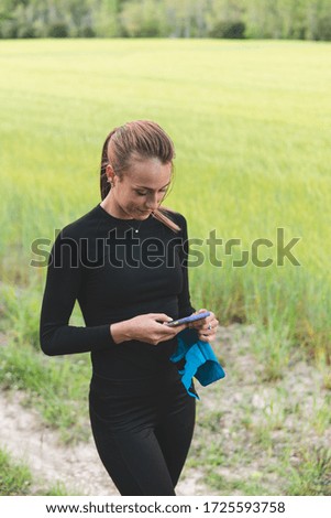 woman looking at the mobile