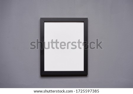 a blank frame on the wall of Melange Gray                