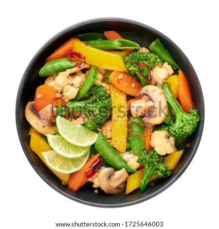 Pad Pak Ruam or Veg Thai Stir-Fried Vegetables in black bowl isolated on backdrop. Pad Pak is thailand cuisine vegetarian dish with mix of vegetables and sauces. Thai Food. Top view Royalty-Free Stock Photo #1725646003