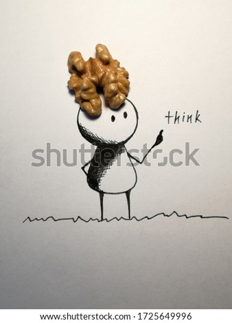 Drawn man with walnuts instead of a brain.