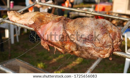 Picture of large beef being grilled