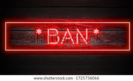 BAN word in red neon style on wooden background for your design tempates.
