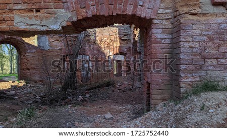 old and ruined red brick building inside view