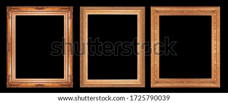 Gold  Picture frame isolated on a black background 