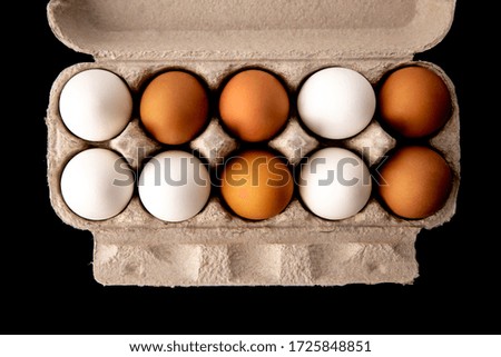 
eggs on a black background eggs in a package