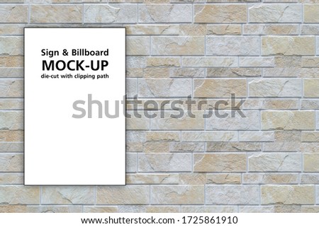 Isolated white billboard mock-up on brick wall, billboard die-cut with clipping path