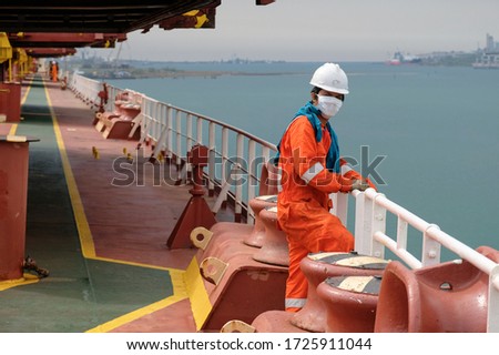 seaman covid-19 main deck mooring equipment Royalty-Free Stock Photo #1725911044
