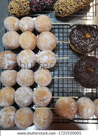 Donat ( Kentang ) ala Asia, Picture of Asian Assorted Donuts with Chocolate frosted, Chocolate glazed, Cheese, Icing Sugar and Sprinkles Donuts.
