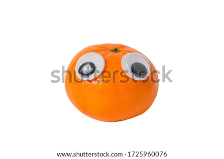 Cute little Mandarin character with big Googly eyes isolated on white background.
