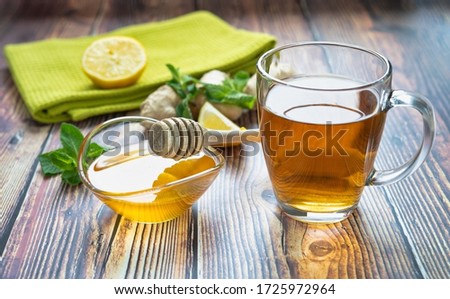 A beautiful picture of a cup of tea on a wooden table