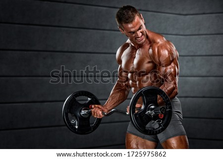 Body Builder Doing Barbell Bicep Curls Royalty-Free Stock Photo #1725975862