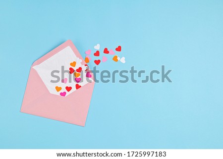 Hearts confetti and pink envelope. Love, valentine day, mothers day greeting card, gratitude, expressing gratitude to doctors and nurses concept