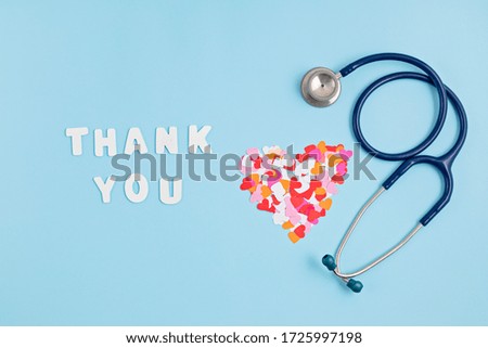 Hearts confetti and text thank you. Expressing gratitude to doctors and nurses idea