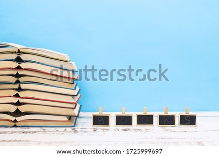 Pile of different books on the table 