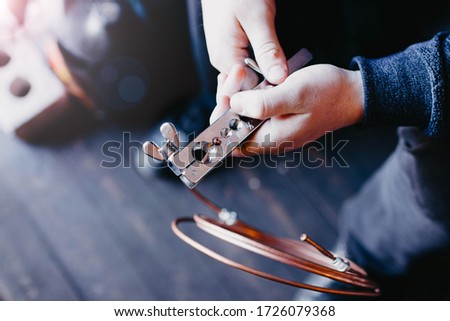 flaring and cutting of a copper tube, car brake system, air conditioning, refrigerator. Roller tool in the hands of the master.