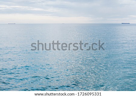 calm black sea of ​​blue color with small waves