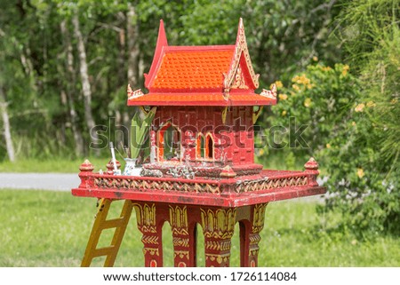 Picture of Thai outdoor spirit house red color