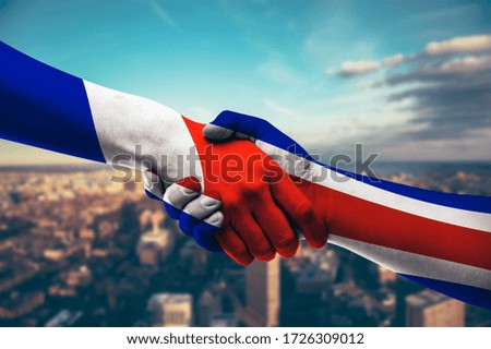 Shaking hands France and Costa Rica