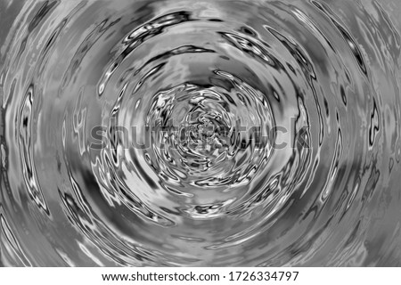 A beautiful view of radial water ripples when something touches its surface or vibration occurs