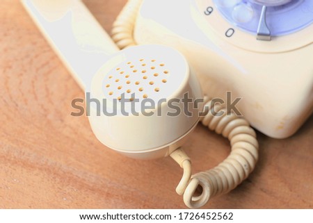 A close up view of an old antique telephone selective focus and shallow depth of field