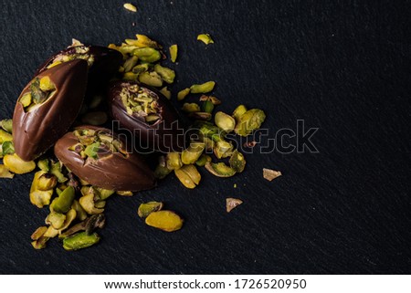 Homemade belgian chocolate. Close-up chocolate.  Religious Holiday, The Sugar Feast After Ramadan. Blurred background. Copy space for text message.