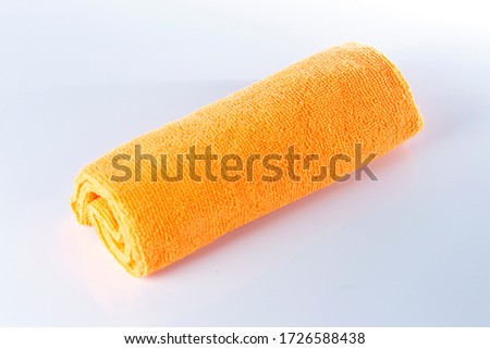 Orange cloths microfiber isolated on a white background