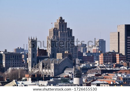 Aerial view of Notre-Dame Basilica and the old Montreal on sunset