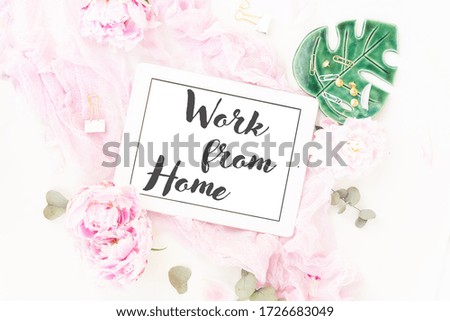 Creative wedding planner composition mock up, pink blanket, flowers on white background, copy space on screen. Flat lay, top view stylish art concept.