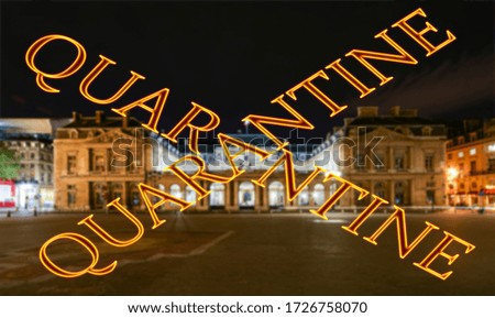 Coronavirus in Paris, France. Quarantine sign on a blurred background. Concept of COVID pandemic and travel in Europe. The historic center of Paris at night