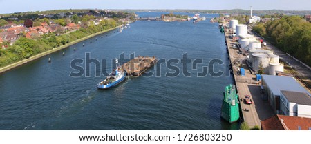 city of Kiel district Holtenau tugboat on the Kiel Canal Royalty-Free Stock Photo #1726803250