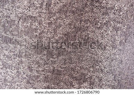 Textures of the beige curtains. Macro image.