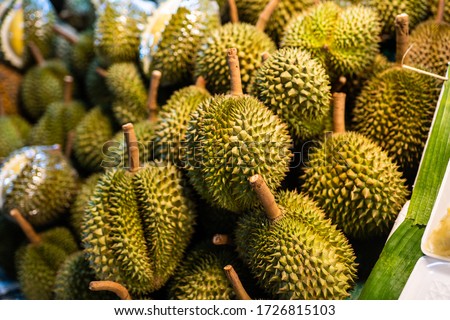 Durian fruit is placed in a basket for sale to the buyer in fruit market,Thailand.Durian that is known as the king of fruits of Thailand. Royalty-Free Stock Photo #1726815103