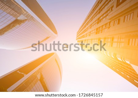 Commercial buildings and airplanes in city