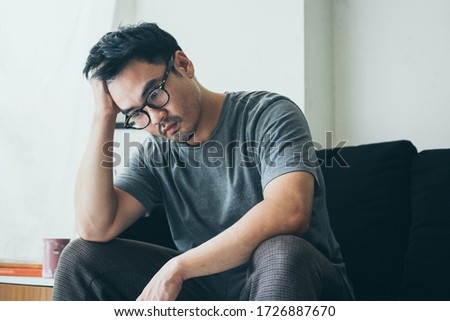 sad serious man.depressed emotion panic attacks alone young people fear stressful.crying begging help.stop abusing domestic violence,person with health anxiety, bad frustrated exhausted feeling down Royalty-Free Stock Photo #1726887670