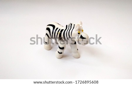 little zebra toys with black isolated white background
