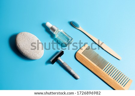 wooden toothbrush on a blue background
