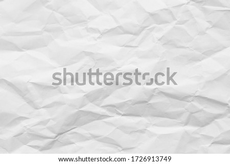 White crumpled paper texture background.
