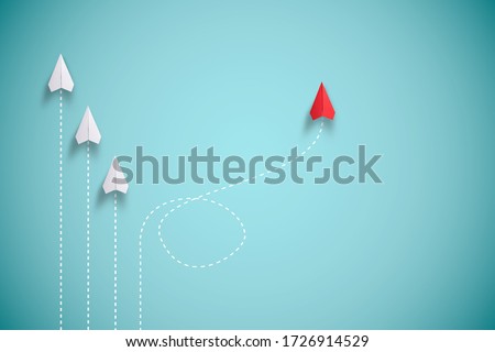 Red paper plane out of line with white paper to change disrupt and finding new normal way on blue background. Lift and business creativity new idea to discovery innovation technology. Royalty-Free Stock Photo #1726914529