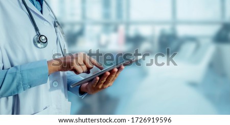 Medicine doctor touching tablet. Medical technology and futuristic concept. Royalty-Free Stock Photo #1726919596