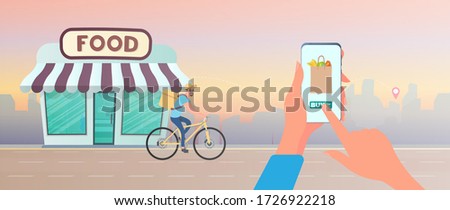 Order food at home. The guy is lucky to order food on a bicycle. Hand holds smartphone. Home delivery, delivery concept. Vector.