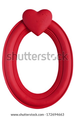 Empty oval shape red frame with carved heart on top isolated on white background. Useful for design and ready to insert any picture inside