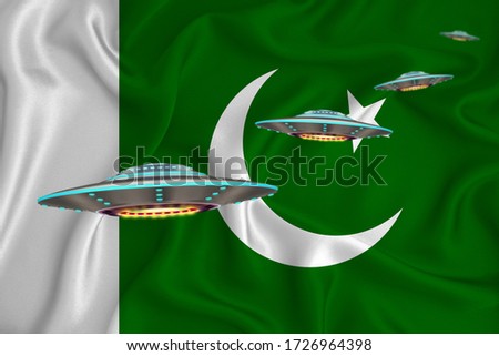 Waving flag of Pakistan. UFO group on the background of the flag. UFO news concept in the country. 3D rendering