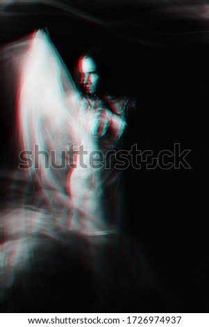 portrait of a Ghost girl in a dress with blurred on a dark background. Black and white photo with 3D glitch effect