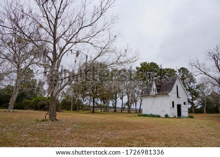 Little chapel in Botany Bay Plantation Heritage Preserve and Wildlife Management Area on Edisto island in South Carolina USA Royalty-Free Stock Photo #1726981336