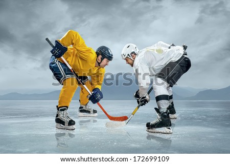 Ice hockey players on the ice Royalty-Free Stock Photo #172699109