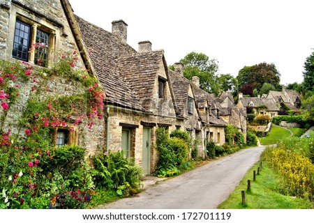 Houses of Arlington Row in the village of Bibury, England Royalty-Free Stock Photo #172701119