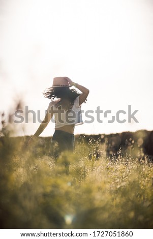 Girl dancing in a Field
